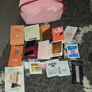 Assorted Beauty Samples with Pink Makeup Bag